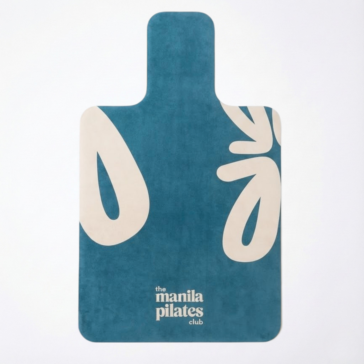The Classic Reformer Mat in teal blue with cream leaf graphics, suede Pilates mat by Tuelles