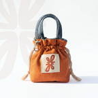 Reversible Sock Pocket in orange, drawstring pouch by Tuelles
