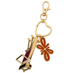 Tuelles Miniformer Keychain, gold-tone mini Pilates reformer keychain with an arrow charm