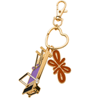 Tuelles Miniformer Keychain, gold-tone mini Pilates reformer keychain with a terracotta flower charm